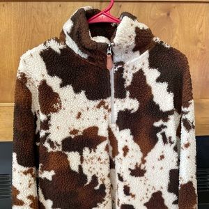 Cow print 1/4 zip Sherpa pull over. Large/extra large